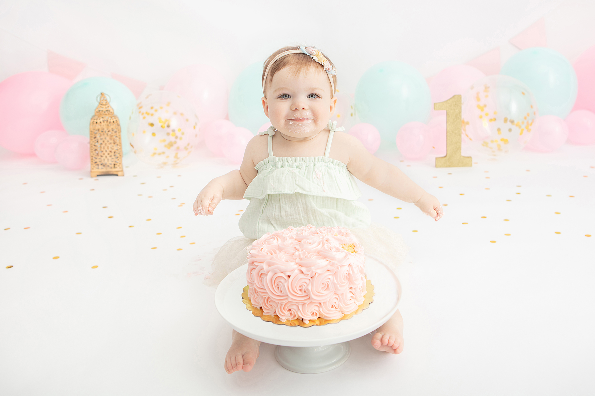 smiling first birthday portrait by Looking Up Photography